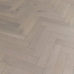 Liberty Floors Pebble Grey Oak - Herringbone Parquet 14mm Engineered Real Wood Flooring (219386) -Cheap Plankora Store pebble grey oak herringbone parquet 14mm engineered real wood flooring 219386 p85834 201395 image